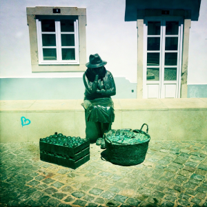 Statue of Portuguese food seller in Algarve